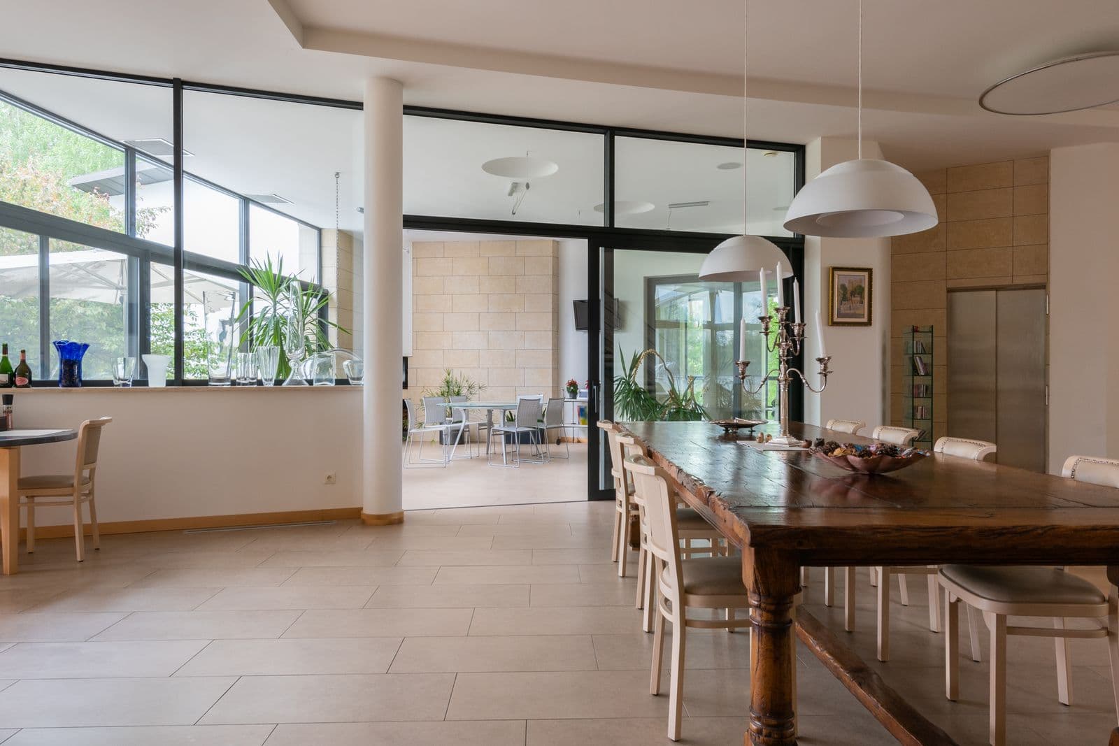 Dining area with a timber table and soft natural light