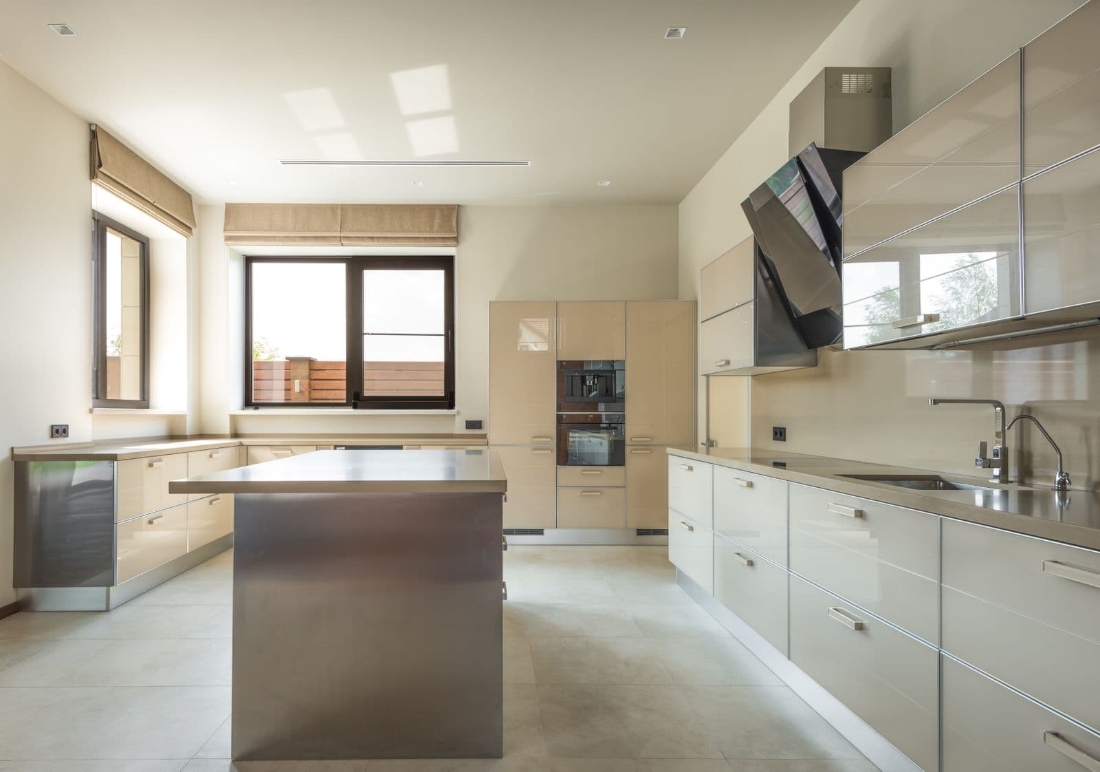 Contemporary kitchen with a large island and natural light